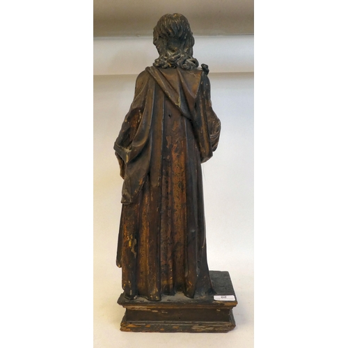 20 - An 18th/19thC carved wooden and polychrome standing biblical figure, on an integral plinth  23