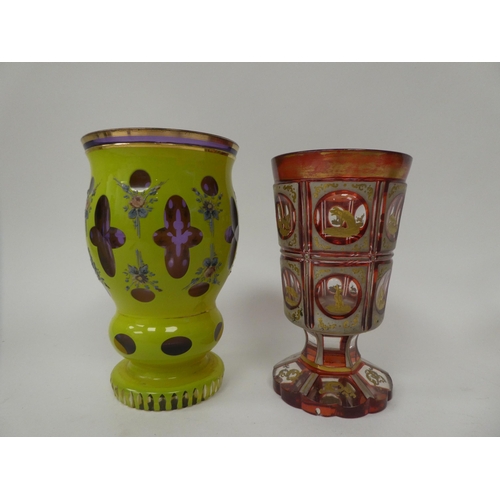 242 - Four late 19th/early 20thC items of decorative glassware: to include a pedestal wine, etched and eng... 