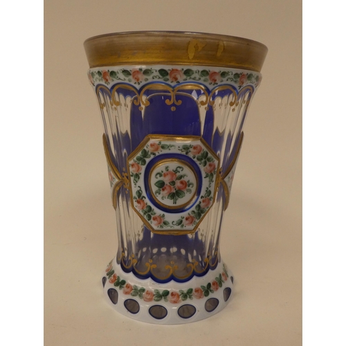 242 - Four late 19th/early 20thC items of decorative glassware: to include a pedestal wine, etched and eng... 