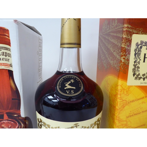 40 - A bottle of Hennessy Special Reserve Cognac 1ltr  boxed; and a bottle of Grand Marnier  70cl  boxed