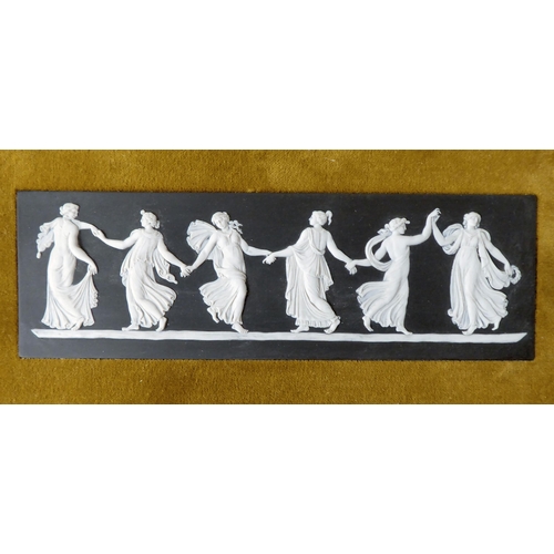 48 - A pair of Wedgwood black basalt and slip glazed plaques, featuring 'The Dancing Hours'  2.5