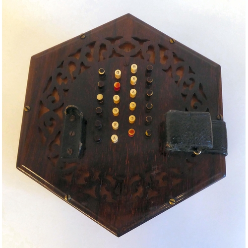 5 - A mid Victorian rosewood concertina of hexagonal form, inscribed C.Wheatstone  serial no.3744 in a f... 