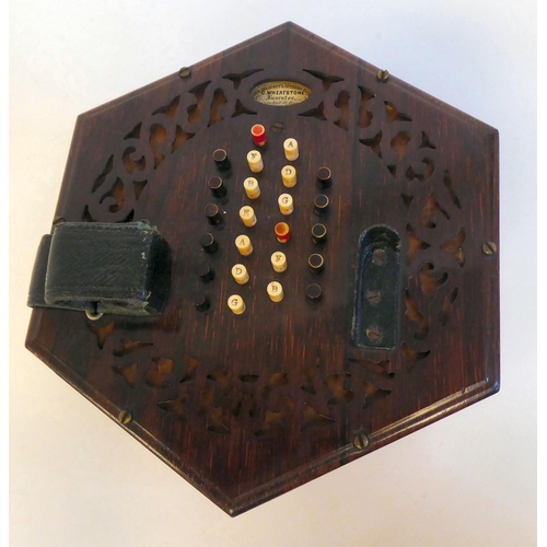 5 - A mid Victorian rosewood concertina of hexagonal form, inscribed C.Wheatstone  serial no.3744 in a f... 