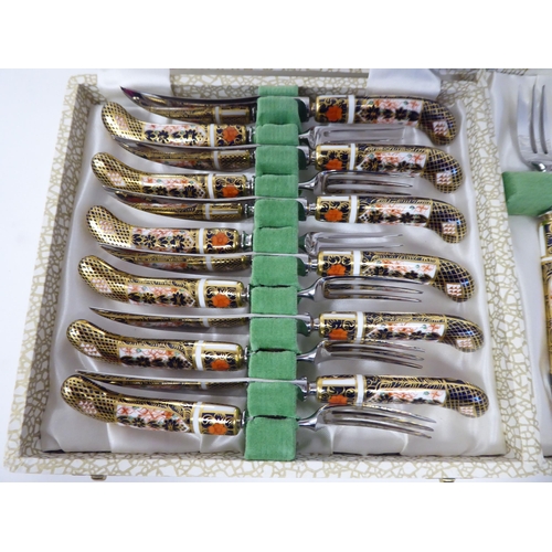 54 - A set of six (as new) Crown Derby porcelain and stainless steel knives and forks, decorated in the I... 