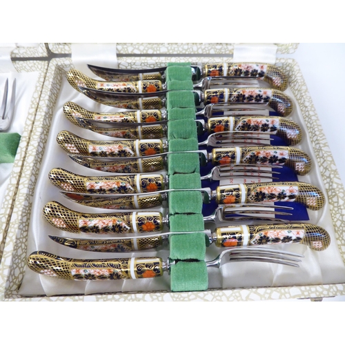 59 - A set of six (as new) Crown Derby porcelain and stainless steel knives and forks, decorated in the I... 