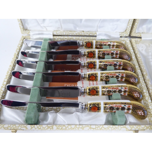 62 - A set of six (as new) Crown Derby porcelain and stainless steel knives, decorated in the Imari palet... 