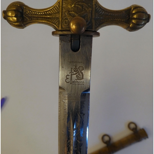 71 - A World War II German Kriegsmarine officer's dagger with a spiraltwist grip  the blade stamped ... 