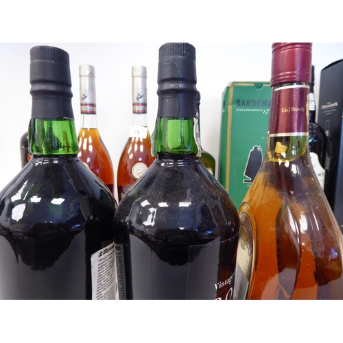 75 - Five bottles of port: to include Grahams 1996  boxed; two bottles of Remy Martin Champagne Cognac; a... 