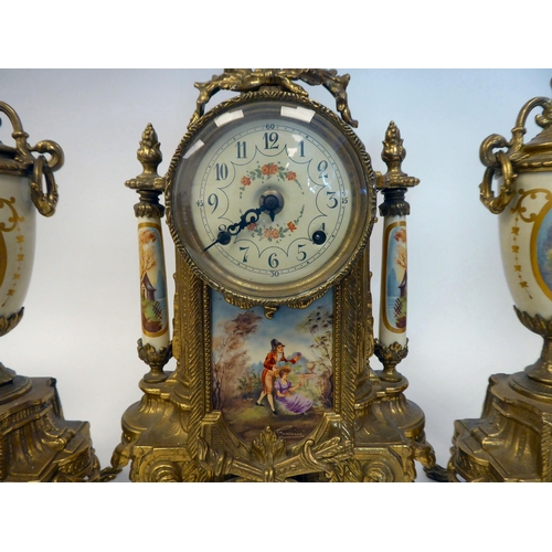 76 - A modern reproduction of a Victorian three piece clock garniture, the brass case with painted faux c... 