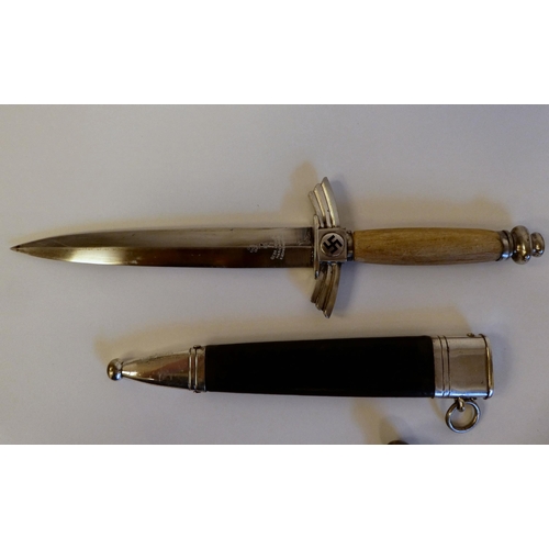 77 - Two World War II German daggers (incomplete)(Please Note: this lot is subject to the statement made ... 