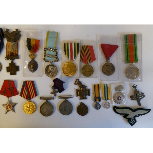 80 - Military medals, some copies: to include a British Great War example, awarded to '2427 PTE CT Catley... 