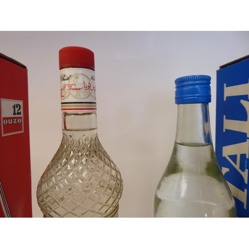 82 - Three bottles of Ouzo, viz. Tsantali, No.12 and King of Arak