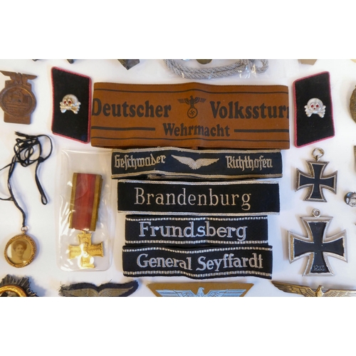 84 - World War II German military collectables, some copies: to include badges(Please Note: this lot is s... 