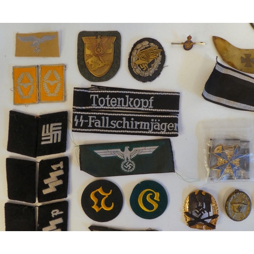 90 - World War II German military collectables, some copies: to include arm bands(Please Note: this lot i... 