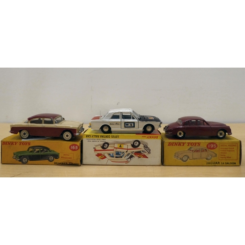 223 - Seven Dinky diecast model vehicles: to include a No.195 Jaguar 3.4 Saloon  boxed