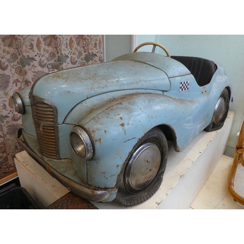 271 - A 1950s cast metal Austin J40 pedal car