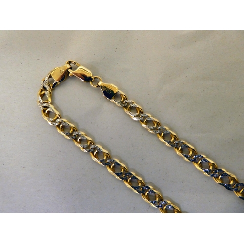 112 - A 9ct white and yellow gold, flat curb link necklace