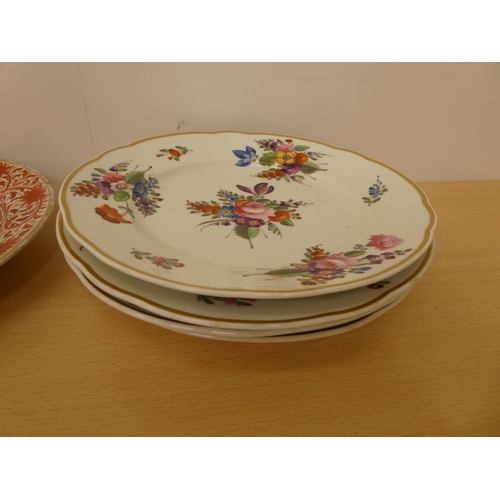 118 - Ceramics: to include four similar early 19thC Derby porcelain plates, each decorated with flora ... 