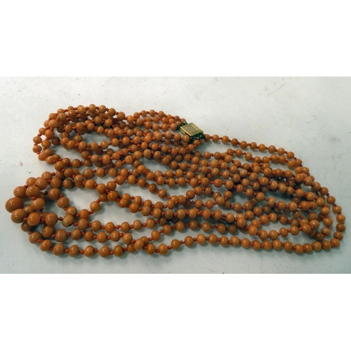 16 - Two carved coral bead necklaces