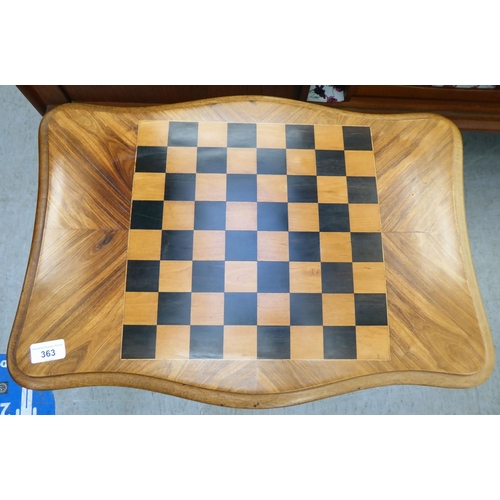 363 - A late Victorian mahogany work table with a hinged, chequerboard top, over a wool basket, raised on ... 