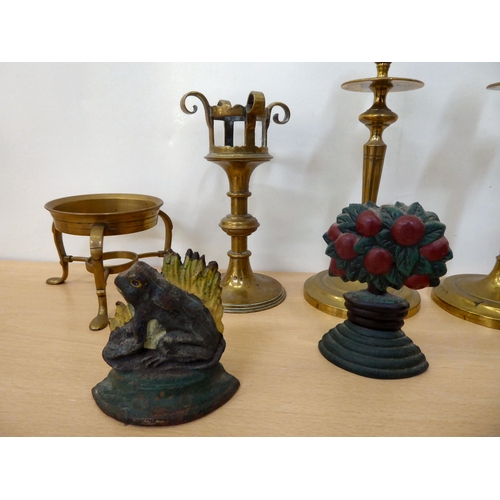 373 - Metalware: to include a pair of brass candlesticks with circular bases  10