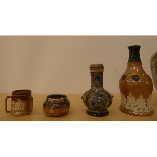 43 - Six Doulton stoneware items of hollowware: to include one of waisted bottle design  4.5