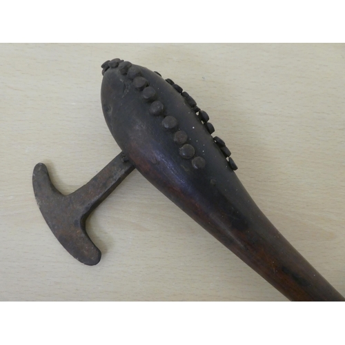 44 - An ethnic wood axe  27