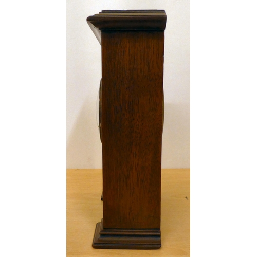 60 - An Edwardian satinwood inlaid, mahogany cased mantel clock; the movement faced by a Roman dial ... 