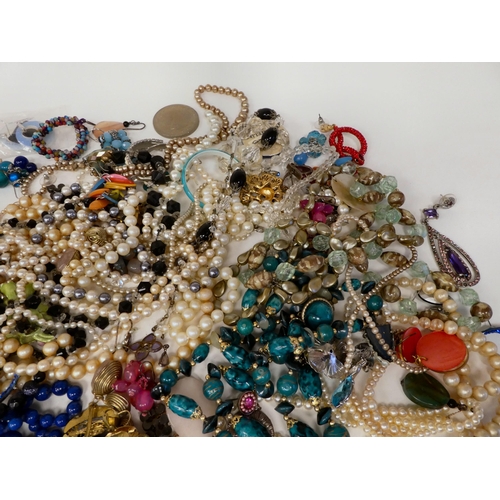 69 - Costume jewellery: to include coloured bead necklaces