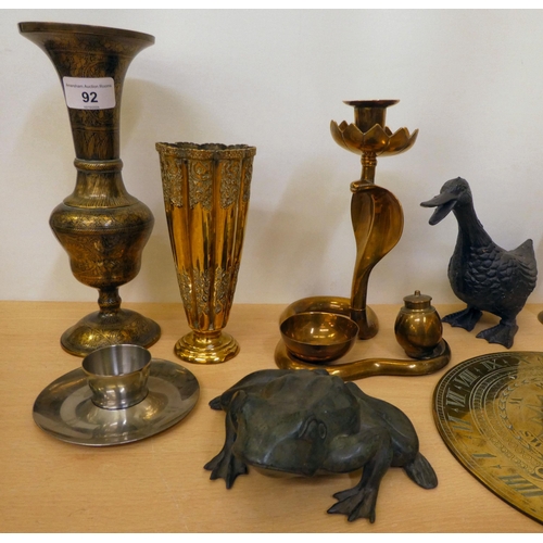 92 - Decorative metalware: to include a brass candle holder, fashioned as a cobra  8.5