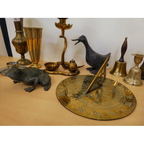 92 - Decorative metalware: to include a brass candle holder, fashioned as a cobra  8.5