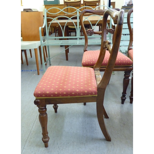 358 - A set of eight William IV rosewood framed balloon back dining chairs, raised on octagonal tapered le... 