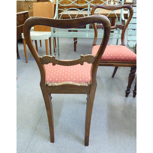 358 - A set of eight William IV rosewood framed balloon back dining chairs, raised on octagonal tapered le... 