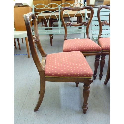 358 - A set of eight William IV rosewood framed balloon back dining chairs, raised on octagonal tapered le... 