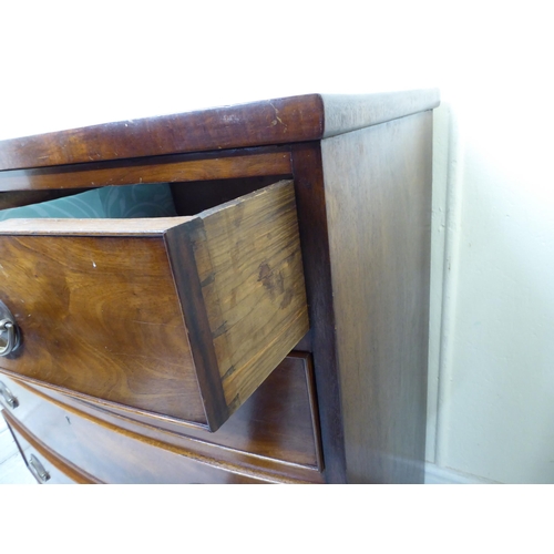 127 - A mid Victorian mahogany bow front, five drawer dressing chest, on splayed feet  35