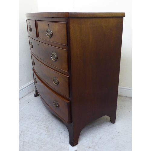 127 - A mid Victorian mahogany bow front, five drawer dressing chest, on splayed feet  35