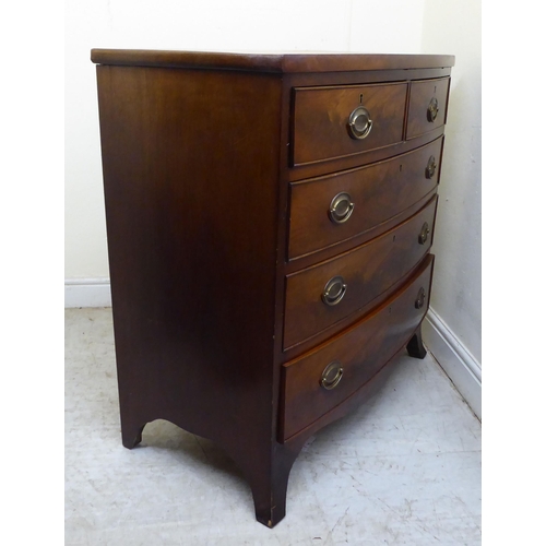 127 - A mid Victorian mahogany bow front, five drawer dressing chest, on splayed feet  35