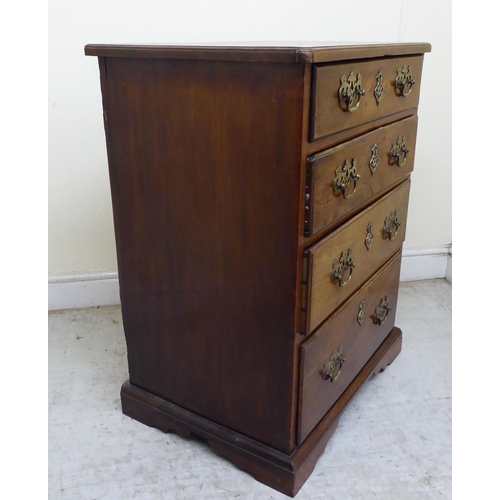 135 - A 19thC mahogany four drawer bedside chest, raised on bracket feet  30