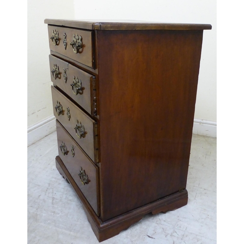 135 - A 19thC mahogany four drawer bedside chest, raised on bracket feet  30