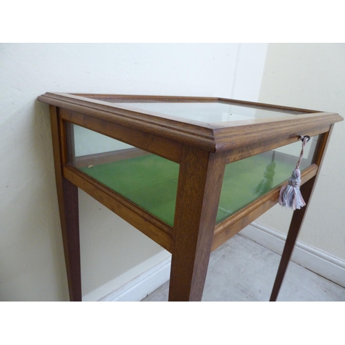 138 - A 20thC yewwood display table, raised on square, tapered legs  30