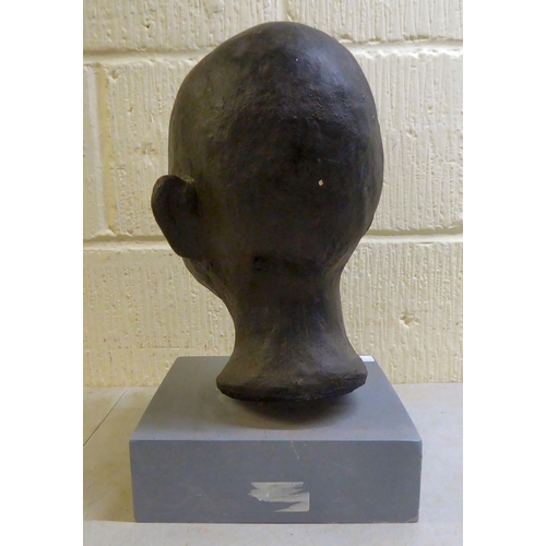 140 - Sandra Lawless - an African bust of a boy, on a plinth  14