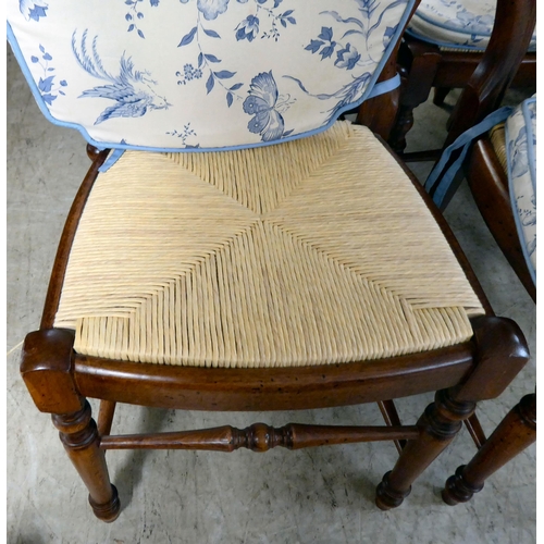 145 - A set of six Victorian style, stained beech framed balloon and bar back dining chairs, raised on tur... 