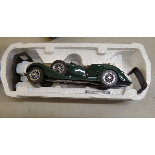 164 - Five Franklin Mint diecast model cars: to include a '1931 Bugatti Royale Coupe De Ville'