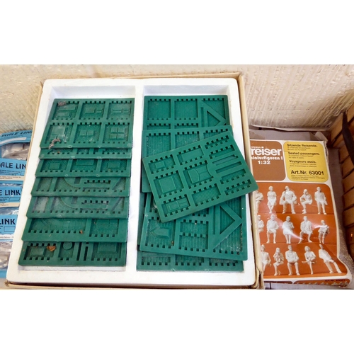 169 - Model railway accessories  various scales: to include moulds for terrain buildings and figures ... 