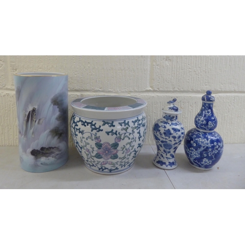 17 - 19thC and later Oriental ceramics: to include a pair of late 19thC Chinese porcelain, tapered vases,... 