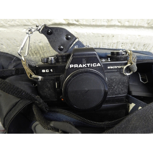 174 - Camera and photographic equipment: to include a 'Pentax MZ-50'; and a 'Praktica BC1'