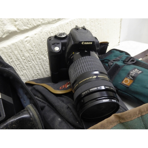 174 - Camera and photographic equipment: to include a 'Pentax MZ-50'; and a 'Praktica BC1'