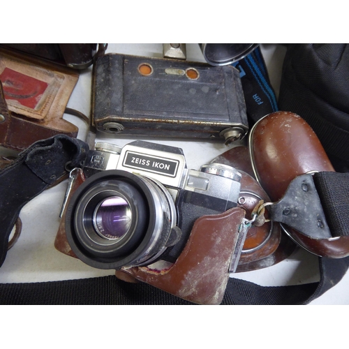 184 - Cameras and photographic equipment: to include a 'Pentax Asahi'; and an 'Olympus OM101'