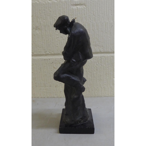 27 - A modern bronze figure of a man, on a pedestal, on a plinth  13