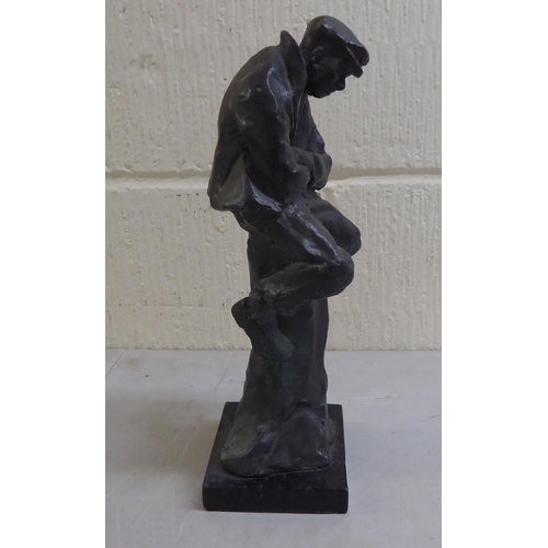 27 - A modern bronze figure of a man, on a pedestal, on a plinth  13